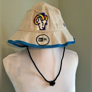 New Era Beige Bucket Hat with Blue Trim and LA Rams Logo